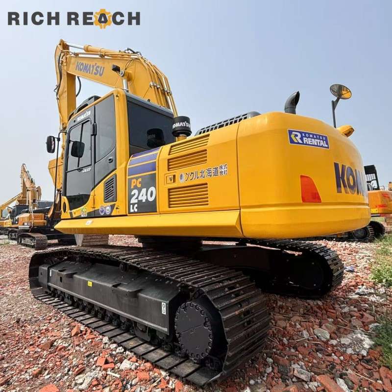 Front view of a 2018 Komatsu PC240LC excavator, priced at $34,722